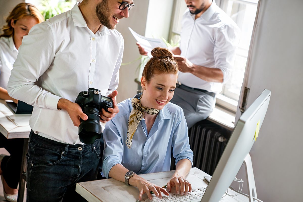 Creative startup young multiethnic business people working together at designer agency in office