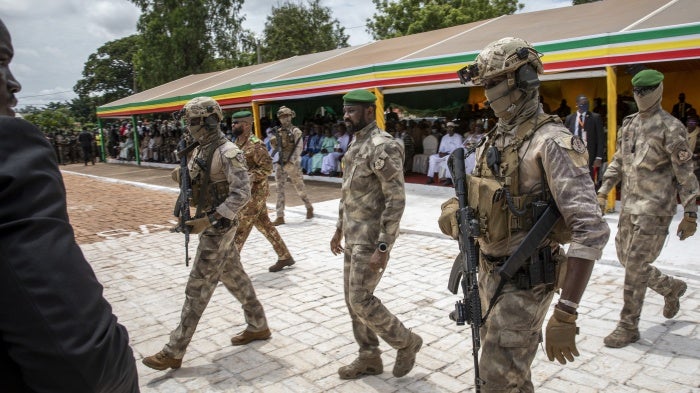 The leader of Mali's junta, Lt. Col. Assimi Goita, center, in Bamako, Mali, September 22, 2022. 