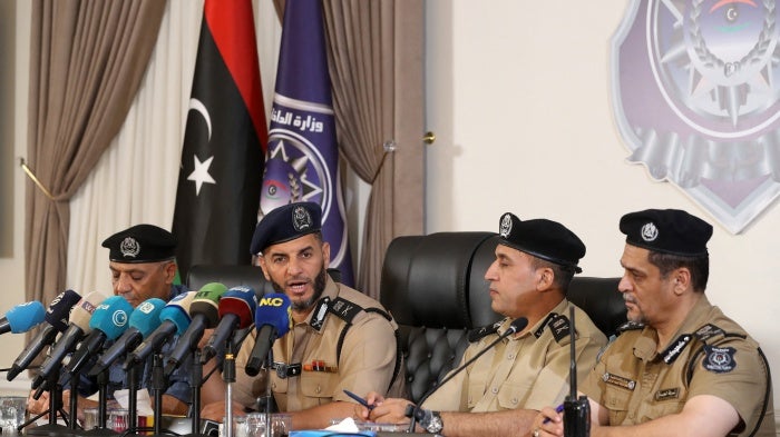  Emad Trabelsi (2nd-L), acting interior minister in the Libyan Government of National Unity, holds a press conference in Tripoli, August 23, 2024.