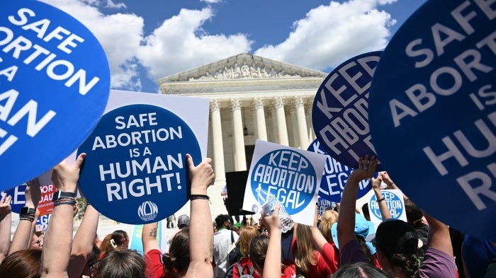 Reproductive rights activists demonstrate in front of the Supreme Court in Washington, DC, on June 24, 2024.