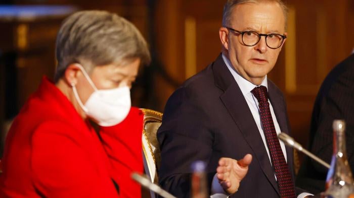 Australian Prime Minister Anthony Albanese, flanked by Foreign Minister Penny Wong