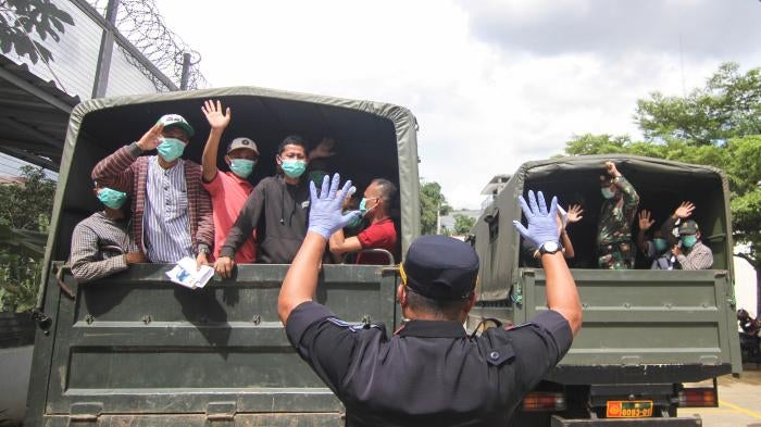 Indonesian prisoners approaching the end of their sentences are released to avoid a coronavirus outbreak in overcrowded prisons in Depok, near Jakarta, Indonesia, April 2, 2020. 