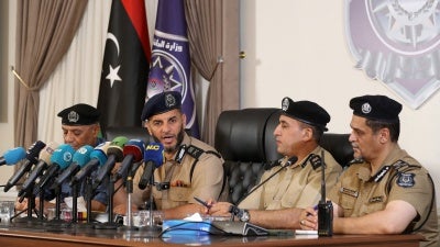  Emad Trabelsi (2nd-L), acting interior minister in the Libyan Government of National Unity, holds a press conference in Tripoli, August 23, 2024.