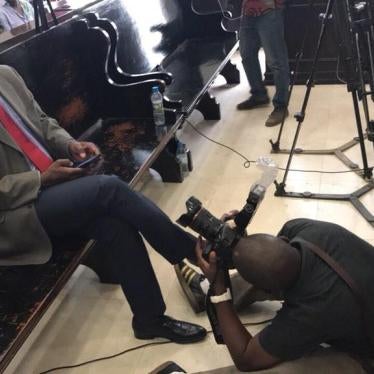 Renowned investigative journalist Rafael Marques awaits the verdict at Luanda Provincial Court. A judge found him and Mariano Bras not guilty on charges of insulting the state on July 6, 2018. © 2018 Luaty Beirao