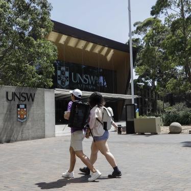 Two students walking on a university campus