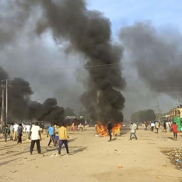 Anti-government demonstrators set a barricade on fire during clashes in N'Djamena, Chad, October 20, 2022.