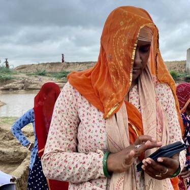 A woman using a phone outside