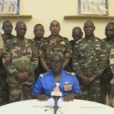 Col. Maj. Amadou Abdramane, front center, with a delegation of military officers, appear on Niger State TV to announce their coup on July 26, 2023, in Niamey, Niger. 