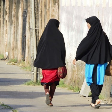 Girls walk along a road in Kattankudy, Sri Lanka, April 25, 2019.