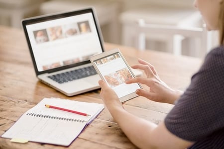 woman browsing customer service blogs in the morning