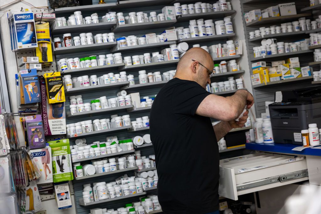 A pharmacist works at a NYC Discount Pharmacy in Manhattan on July 23, 2024 in New York City. 