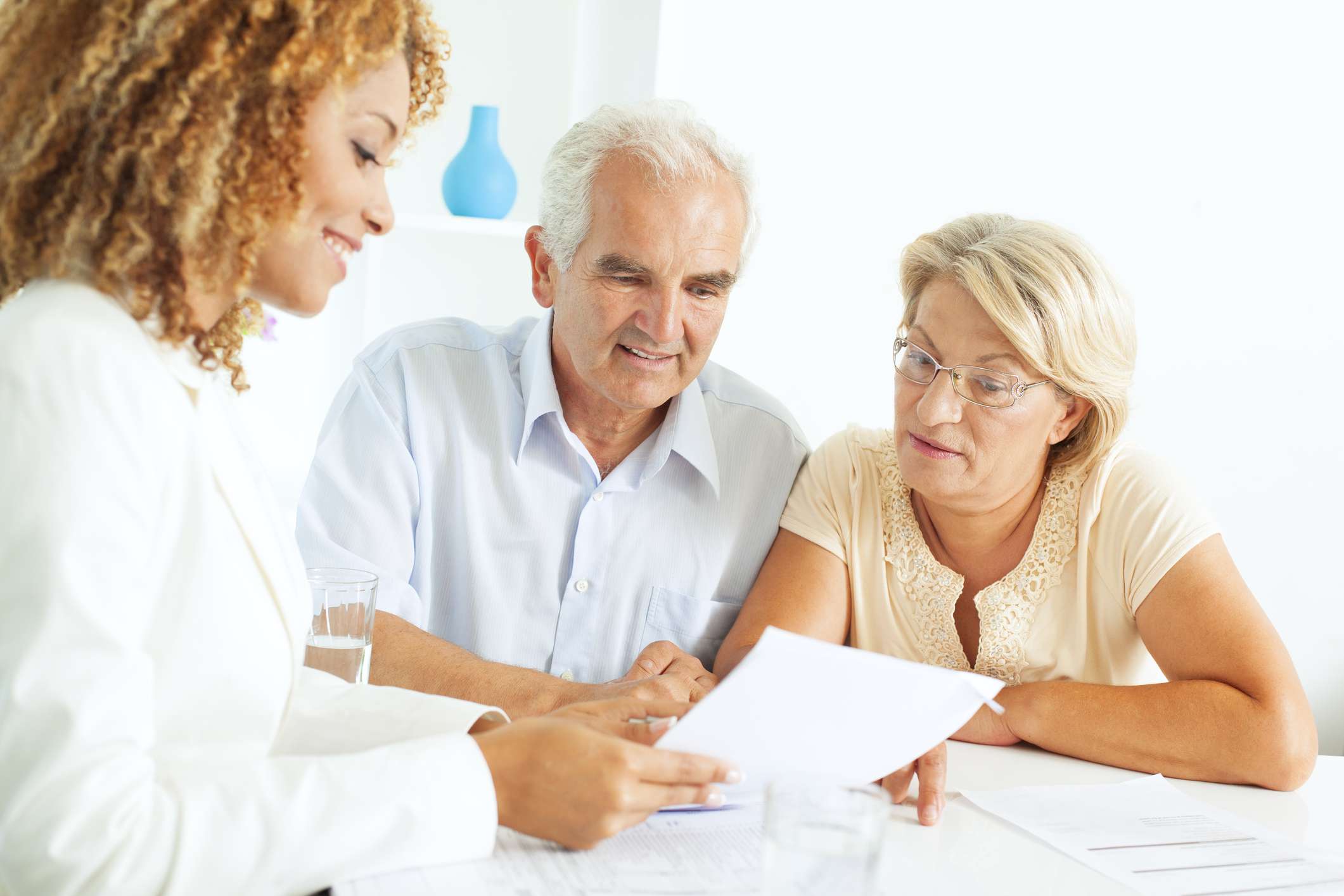 Older couple meeting with financial advisor