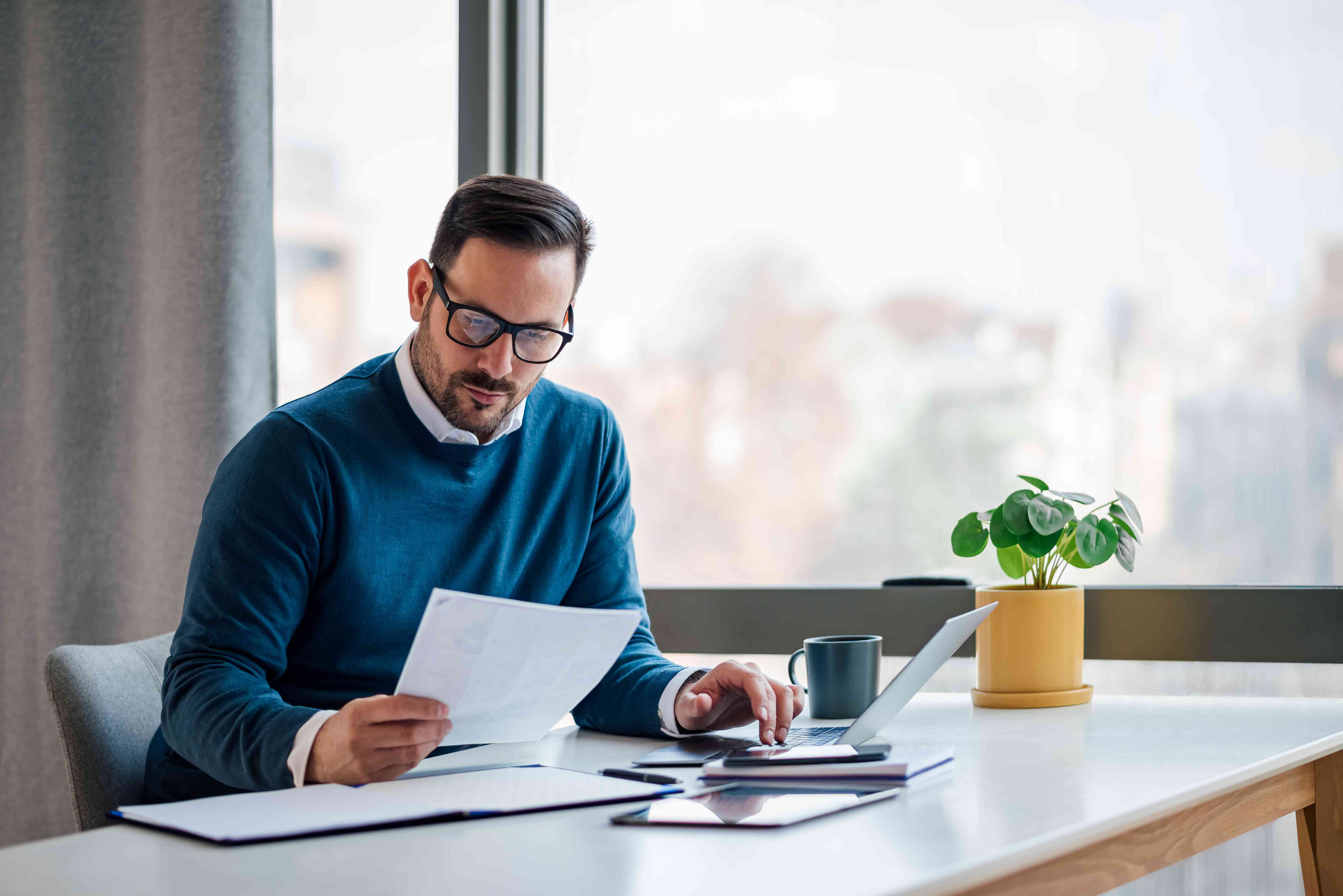 Man with paperwork