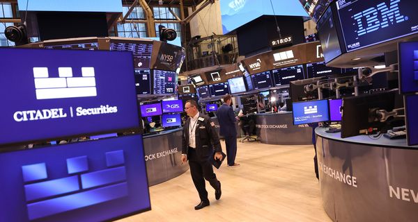 Traders work on the floor of the New York Stock Exchange