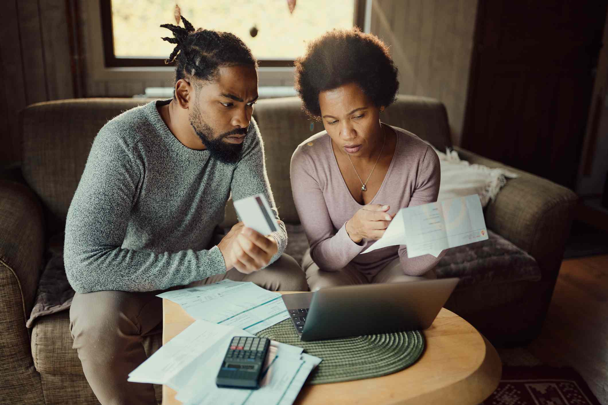 Couple comparing mortgages