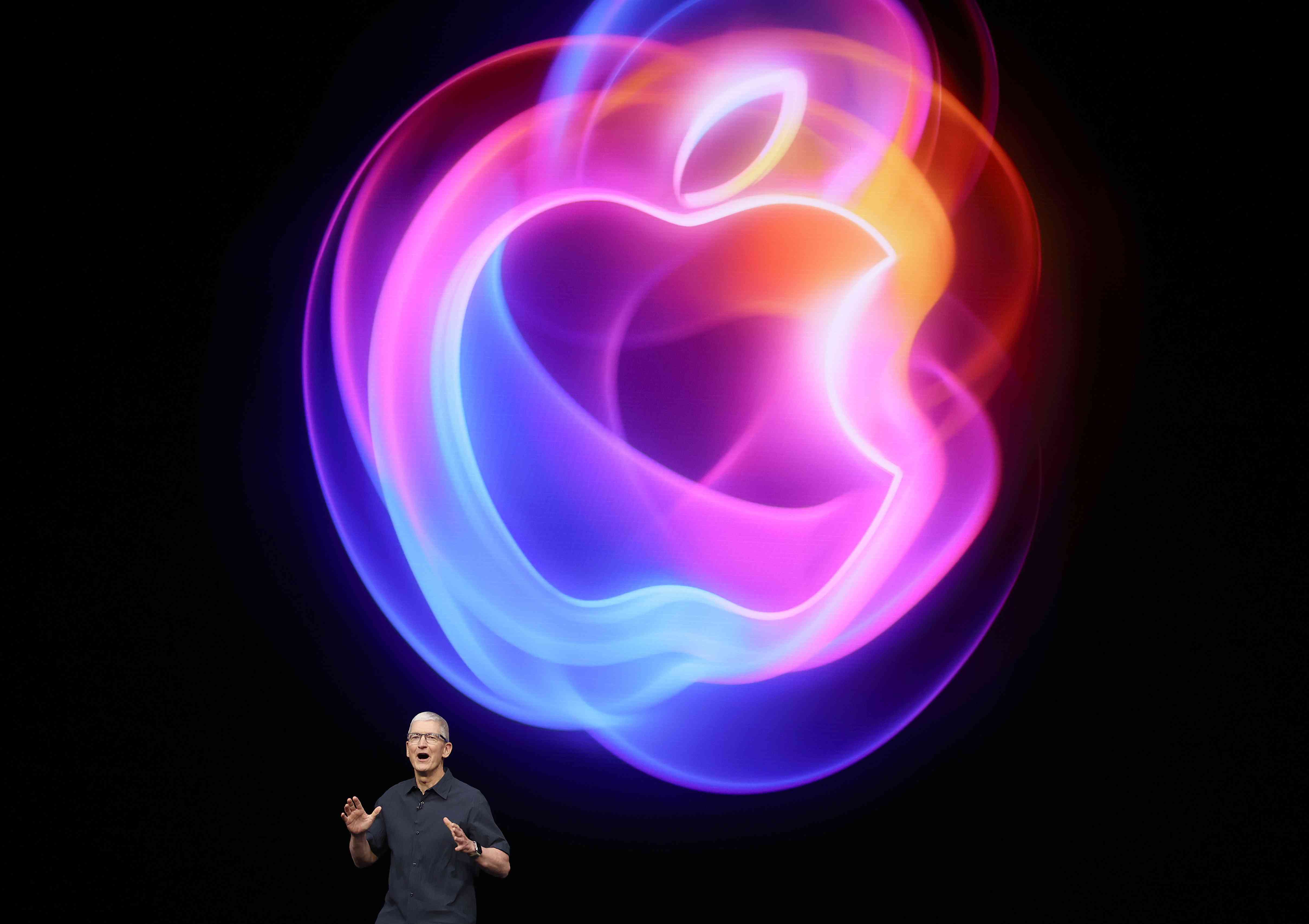 Apple CEO Tim Cook delivers remarks before the start of Apple's "It's Glowtime" event on Sept. 9, 2024