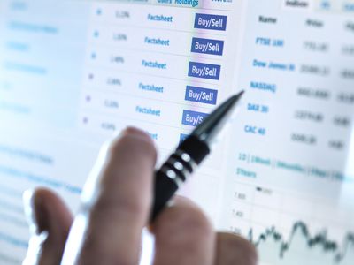 Hand of a Stockbroker Buying and Selling Shares Online