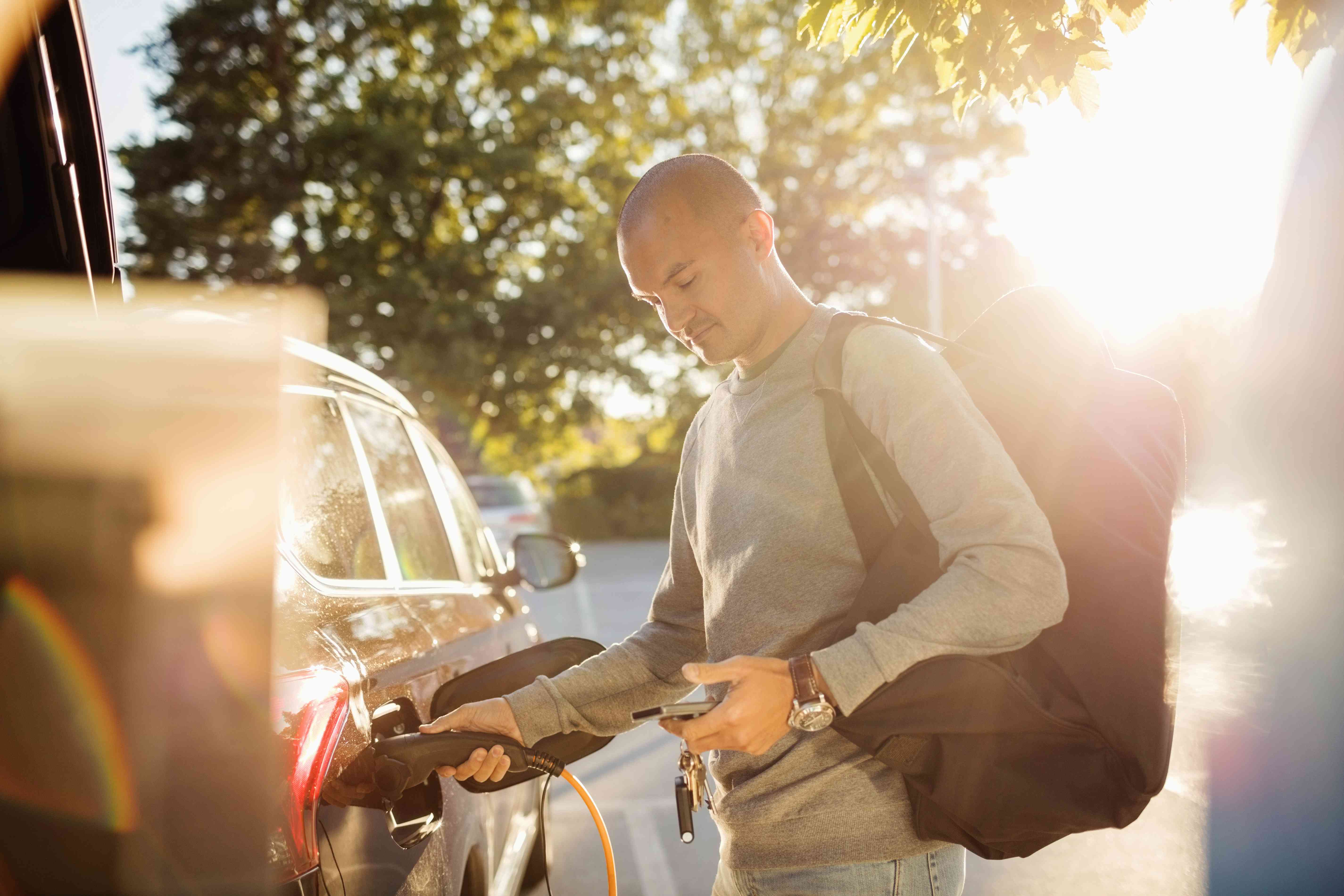 Man Fills Car’s Gas Tank