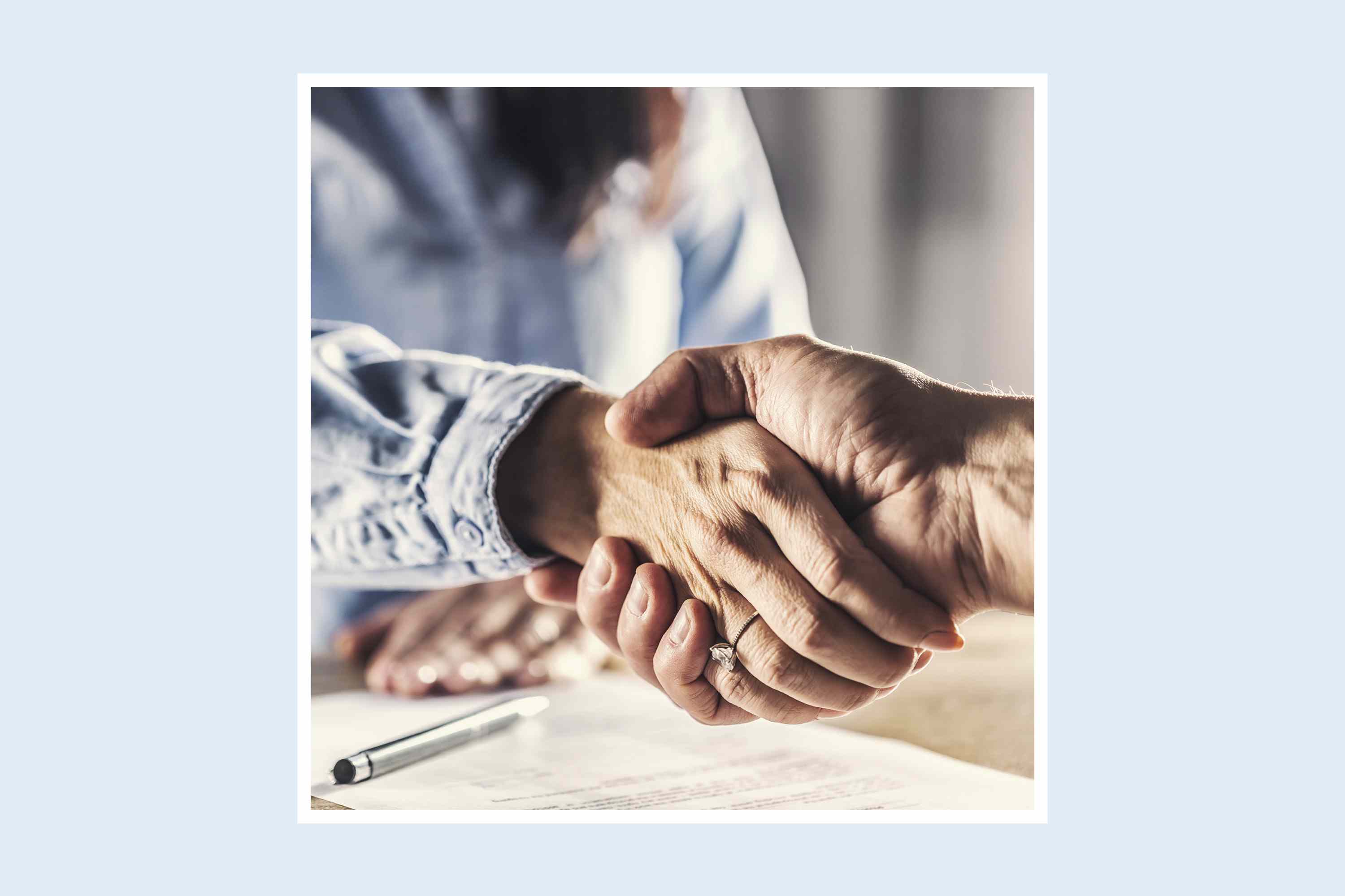 two people shaking hands