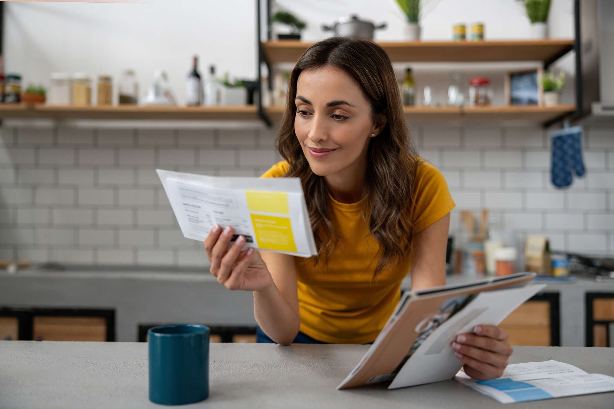 Woman looking at bills