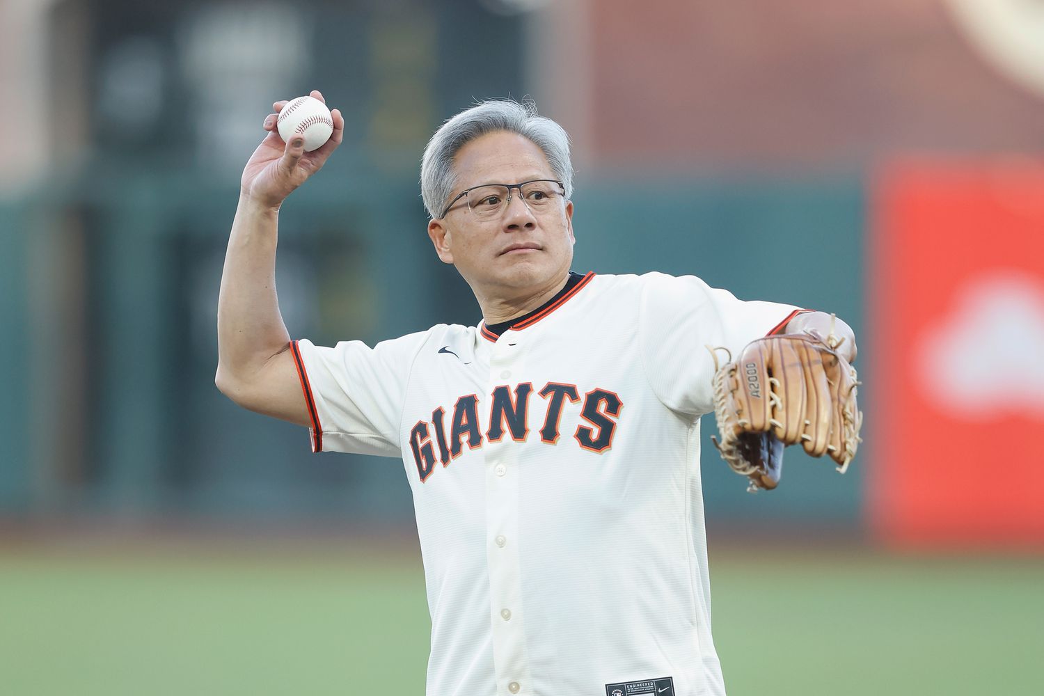 Jensen Huang, CEO of tech company Nvidia, throws out the ceremonial first pitch before the game between the San Francisco Giants and the Arizona Diamondbacks at Oracle Park on September 03, 2024 in San Francisco, California.