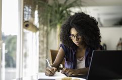 Student researching how much she can win from scholarships