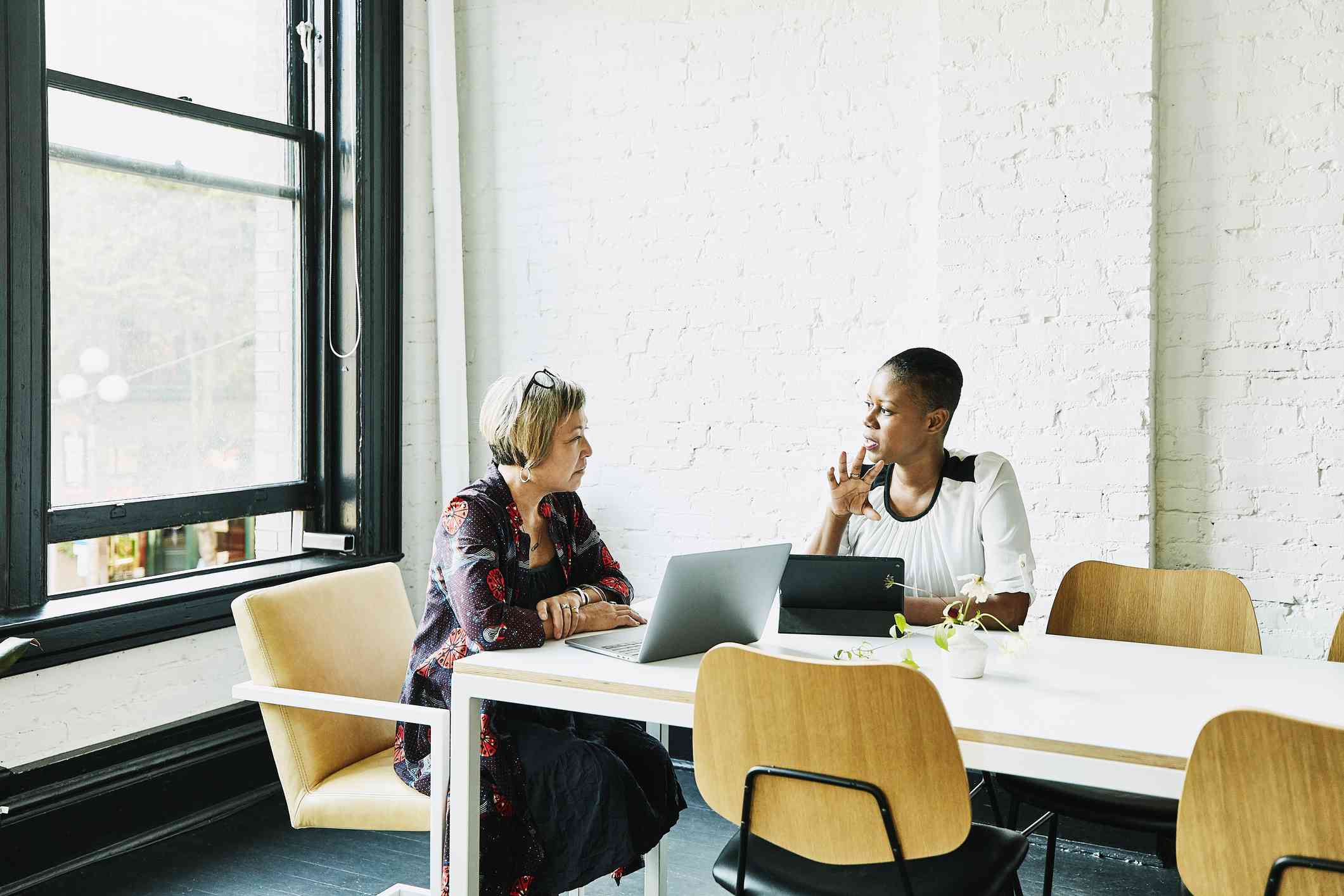 Woman meeting with a financial advisor in a conference room