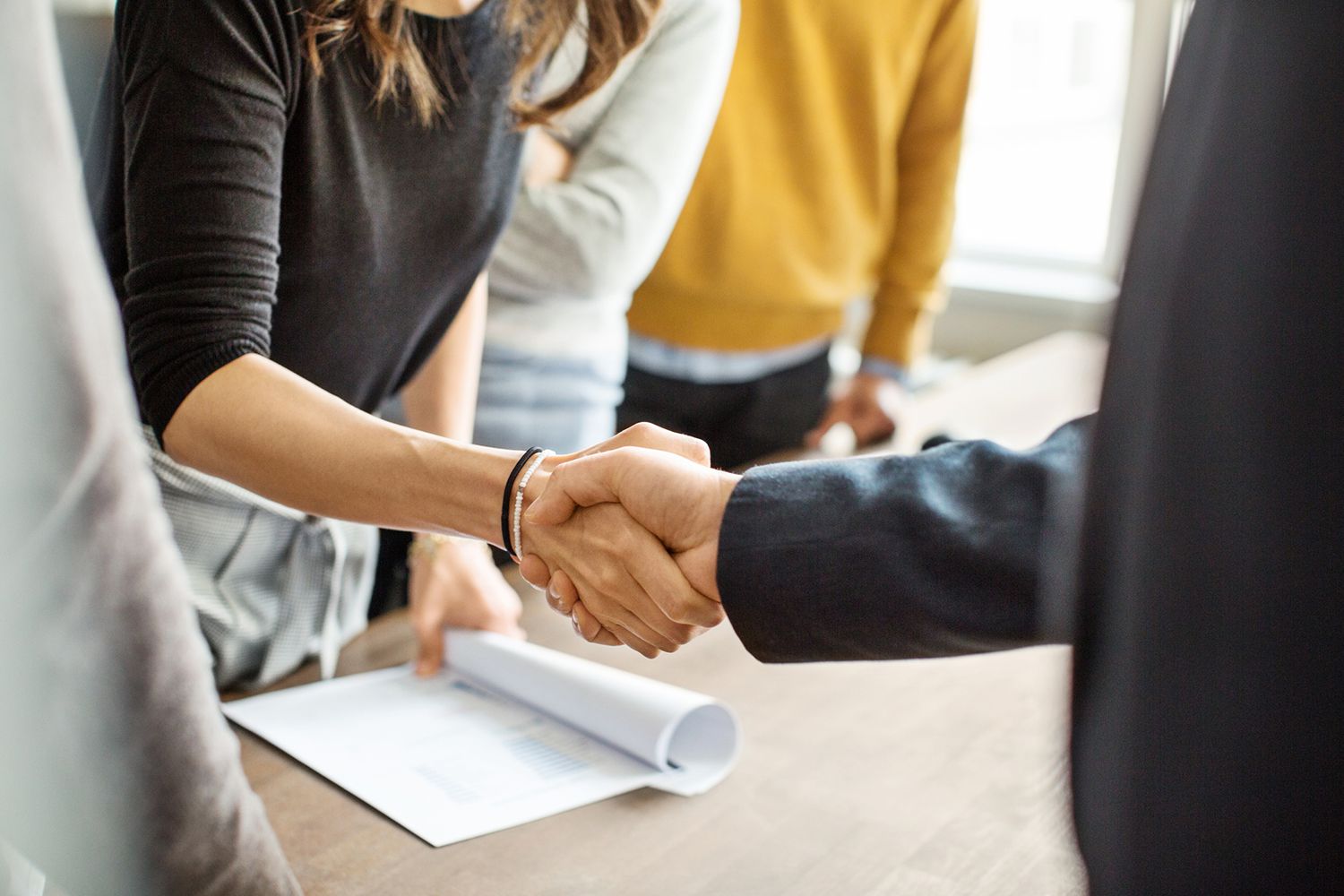 Business People Shaking Hands in Office