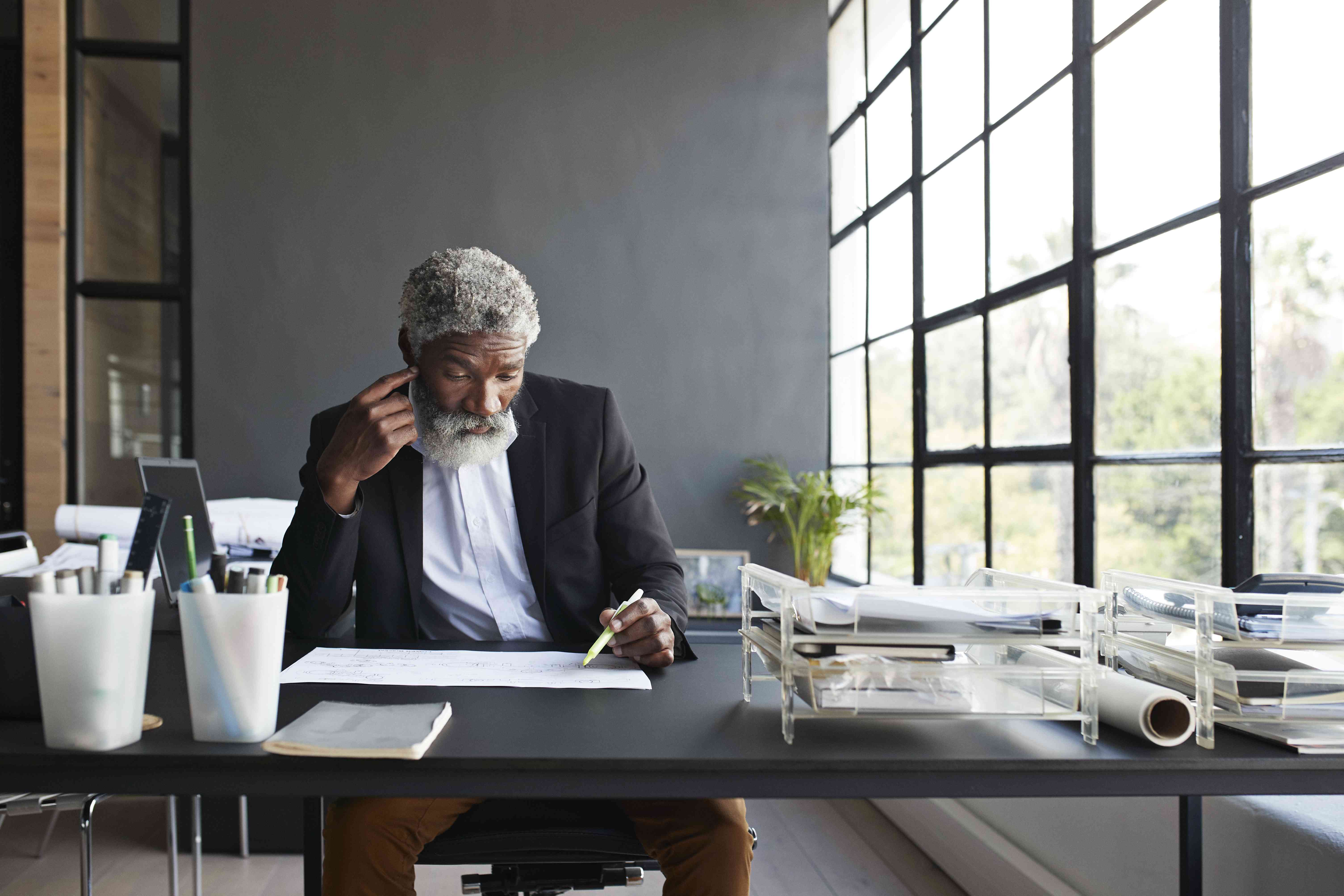 Man looking over papers