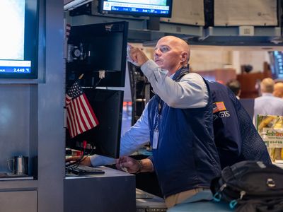 Trader on the floor of the New York Stock Exchange