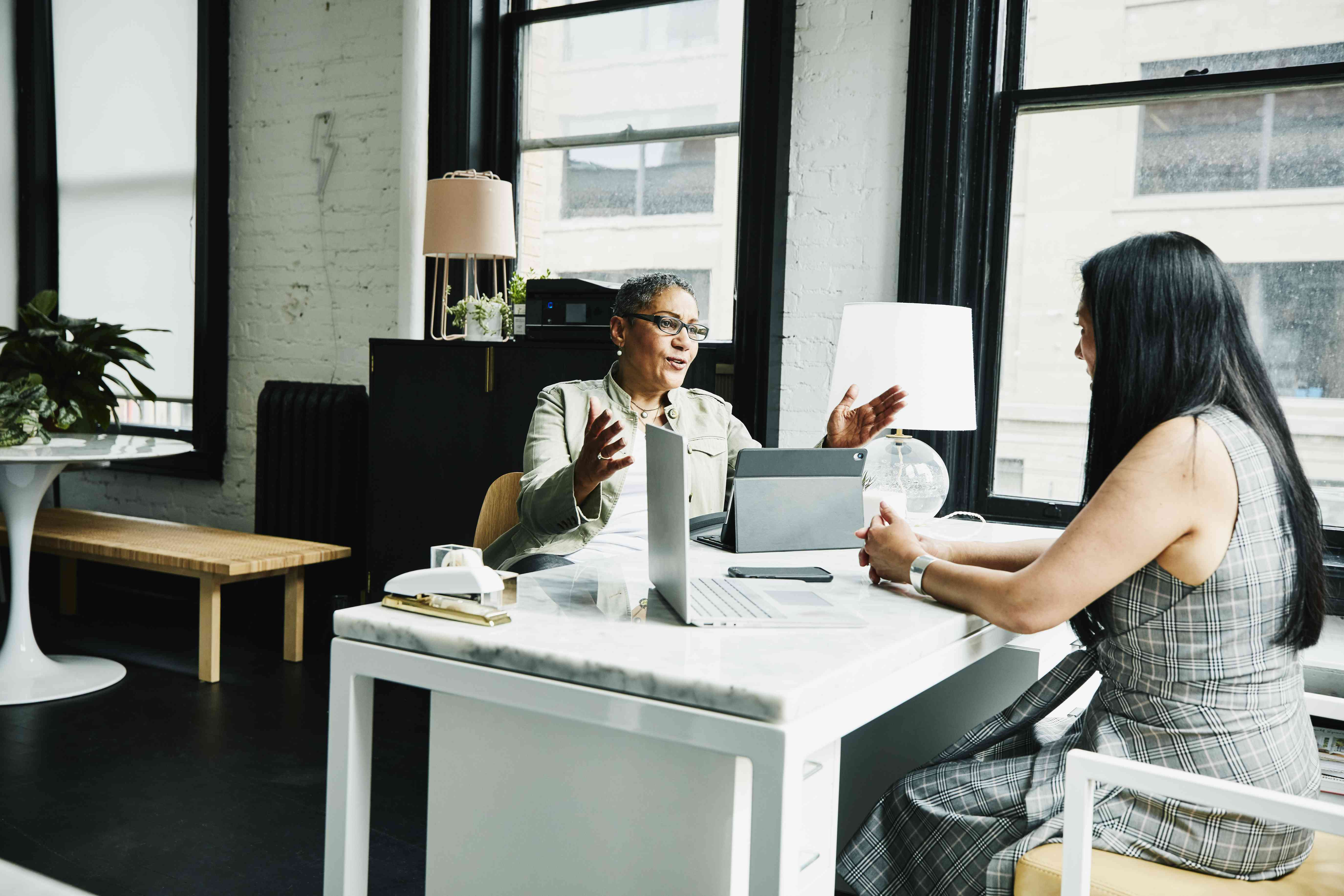 Financial advisor meets with new client for the first time.