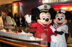 Mickey Mouse, Minnie Mouse, and the model of the Disney Dream at the Disney Dream Preview Event