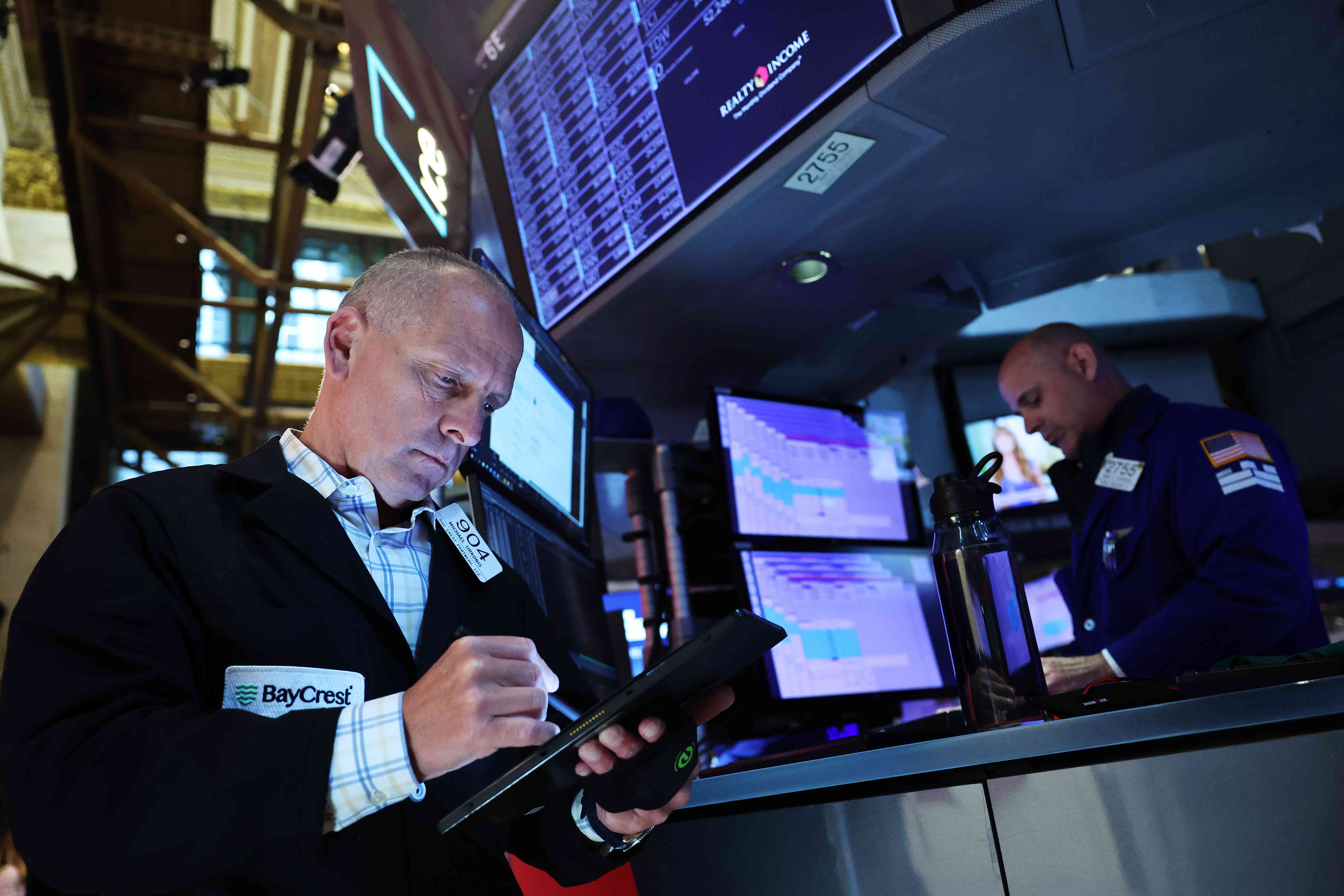 Traders work on the floor of the New York Stock Exchange during morning trading on June 12, 2024 in New York City.