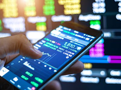 Man Checking Stock Market on Mobile Phone