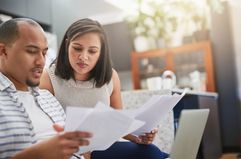 Couple looking at paperwork