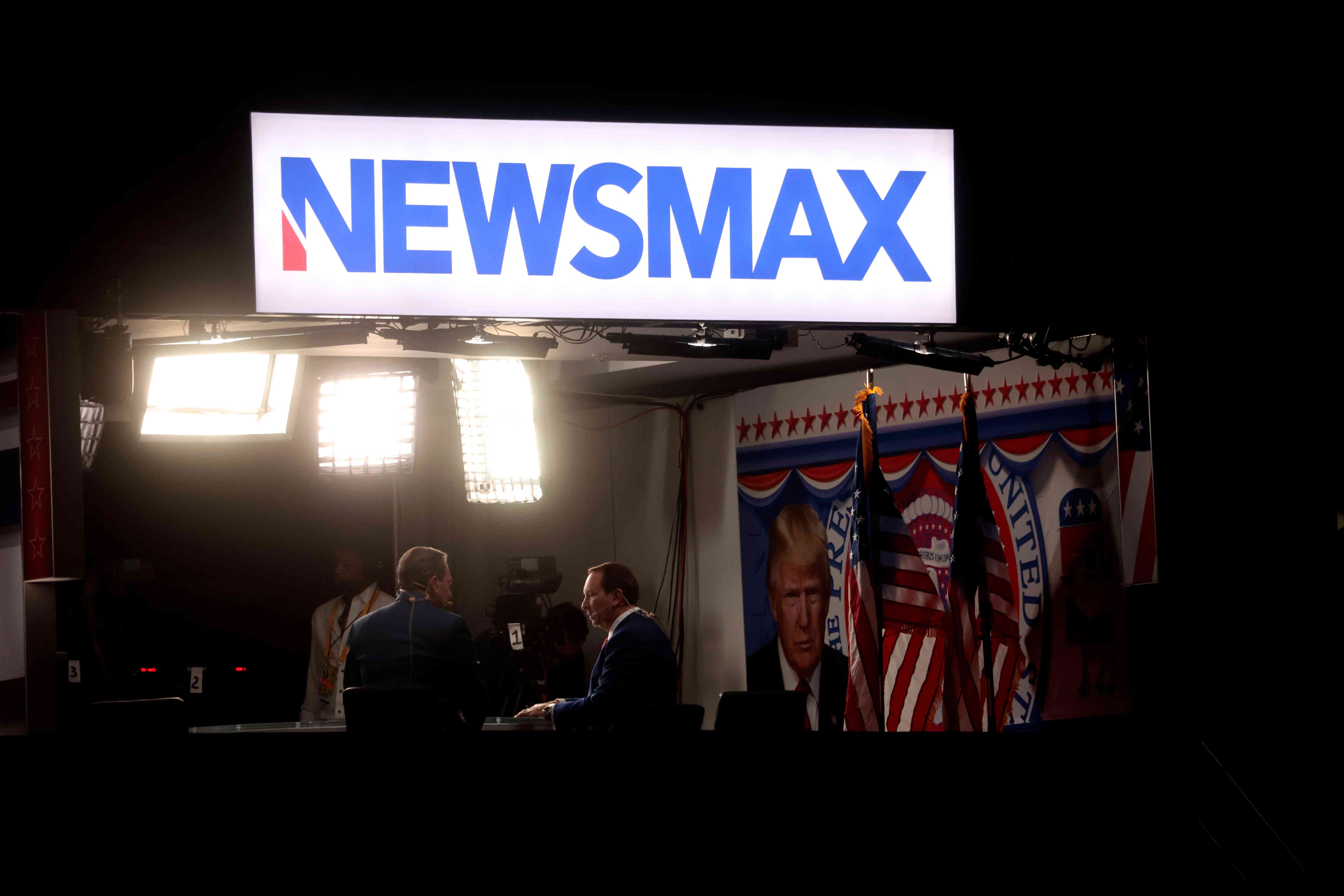 Newsmax signage during the Republican National Convention (RNC) at the Fiserv Forum in Milwaukee, Wisconsin, on July 18, 2024