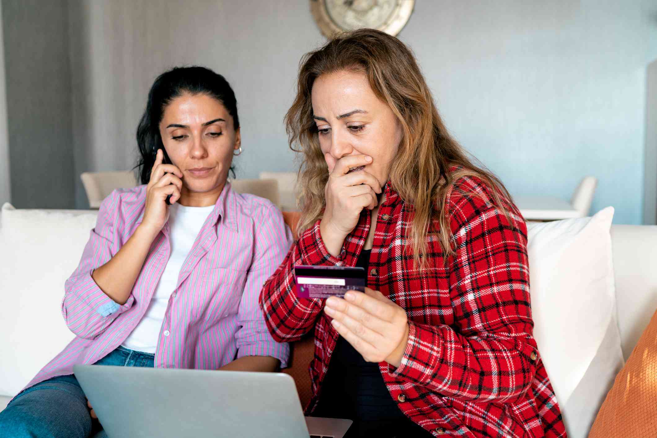 Woman realizing she was scammed online