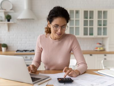 Woman tries to determine which personal loan is easiest to get approved for