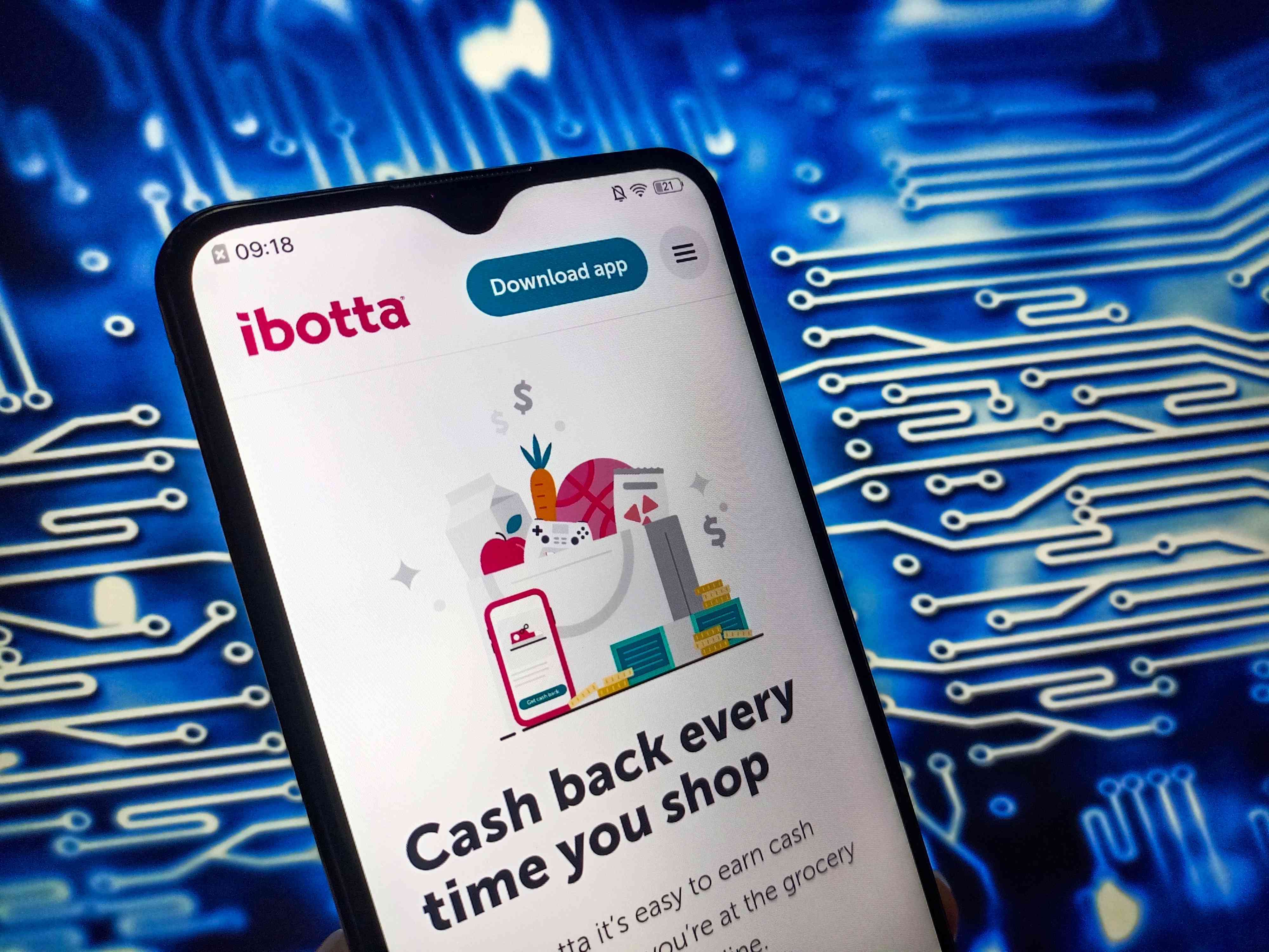 The Ibotta site on a phone screen.