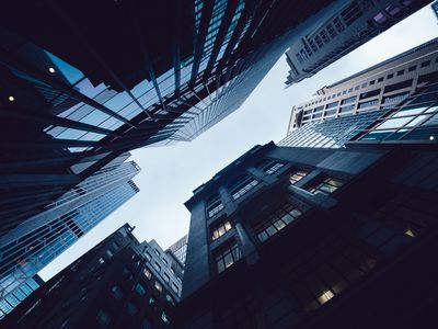 Contemporary financial skyscrapers from ground view against sky