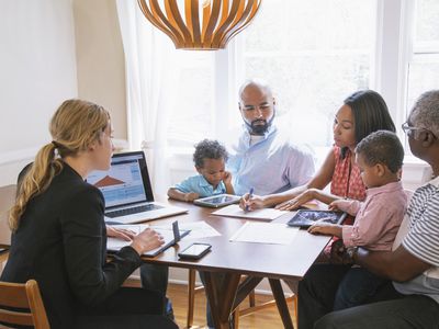 Financial advisor talking to clients