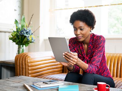 A woman uses a tablet