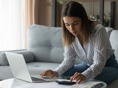 Woman checks why she was denied a personal loan