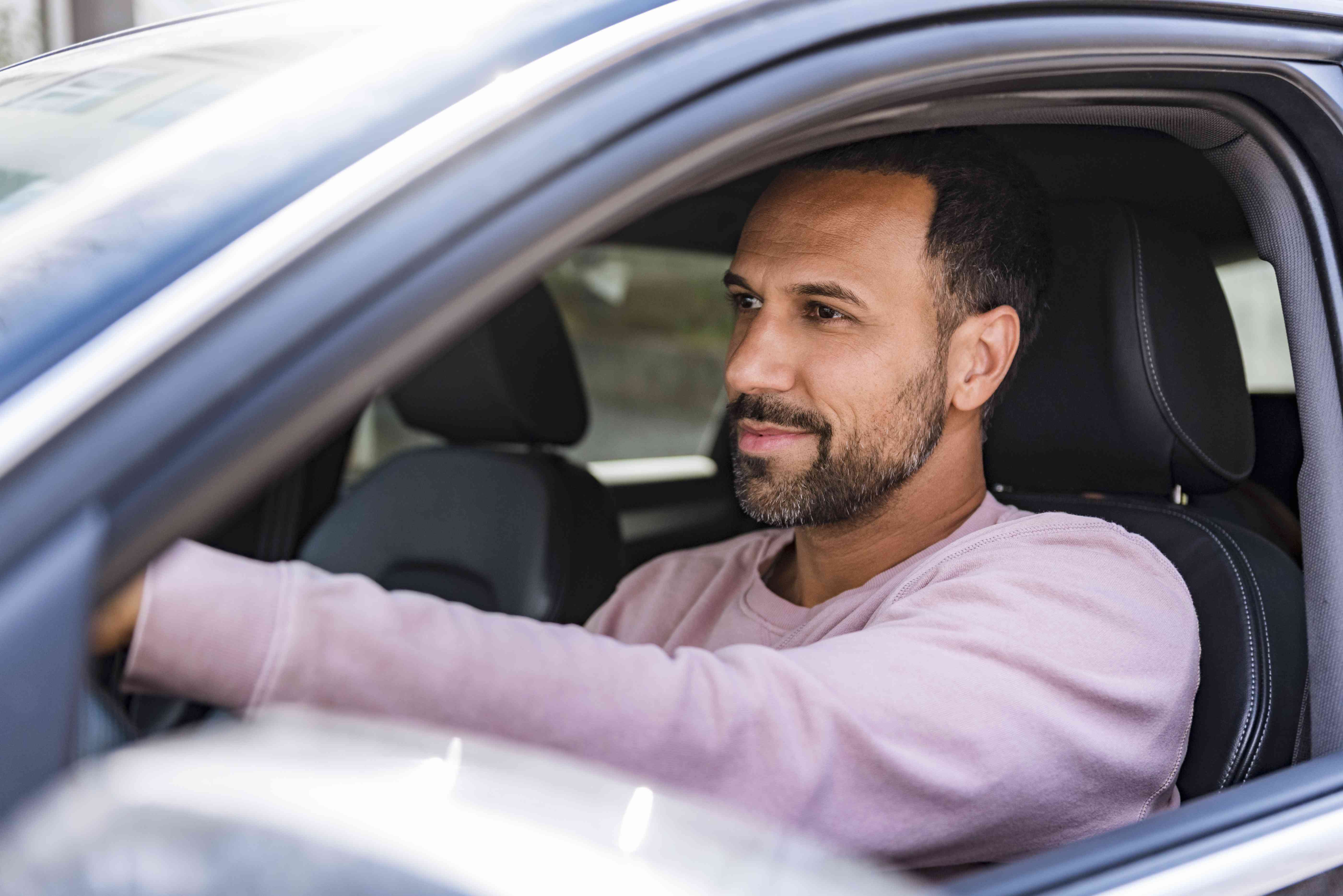 Man Drives Car