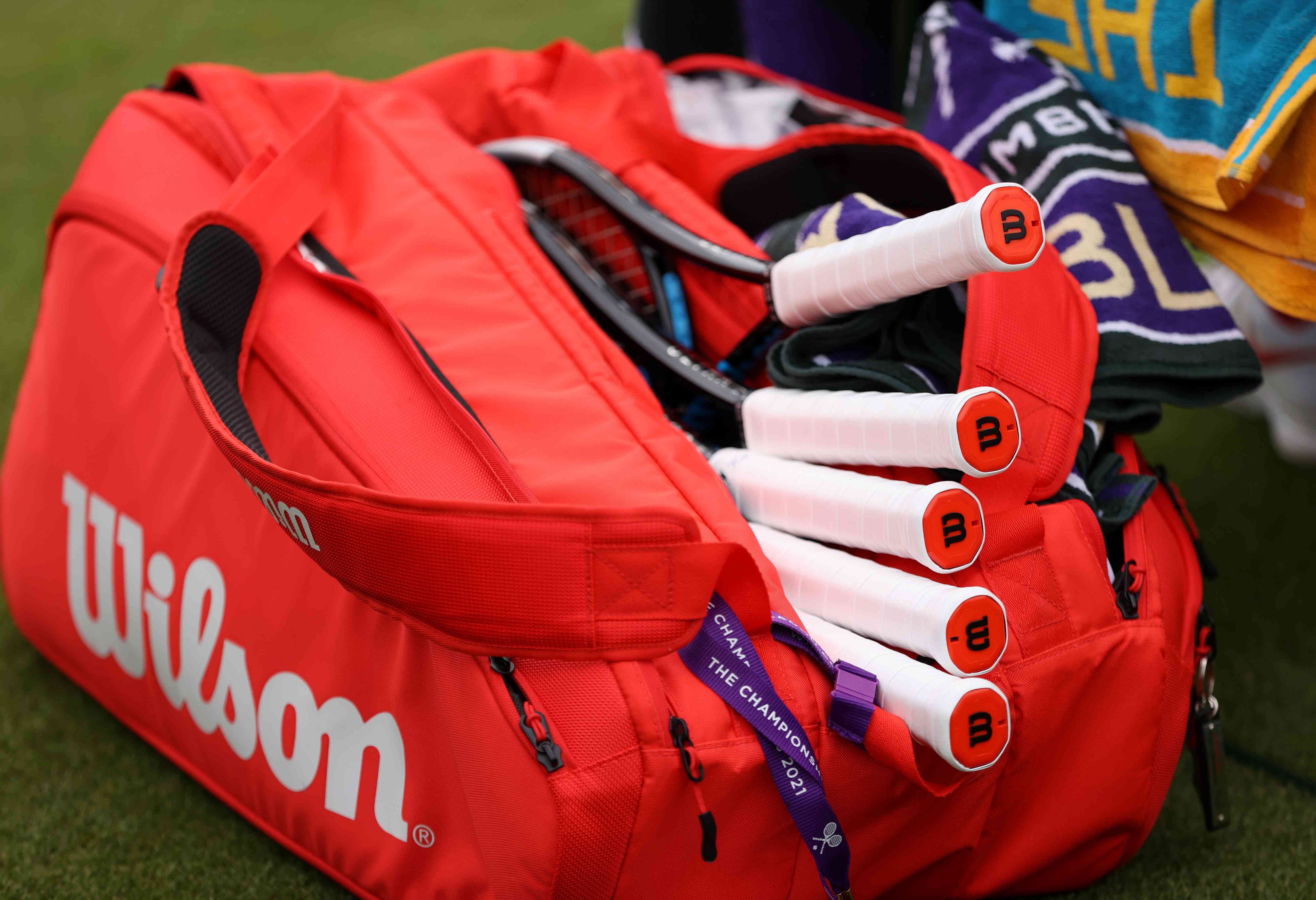 Wilson bag with several tennis rackets. 