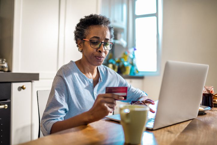 Woman buying on computer