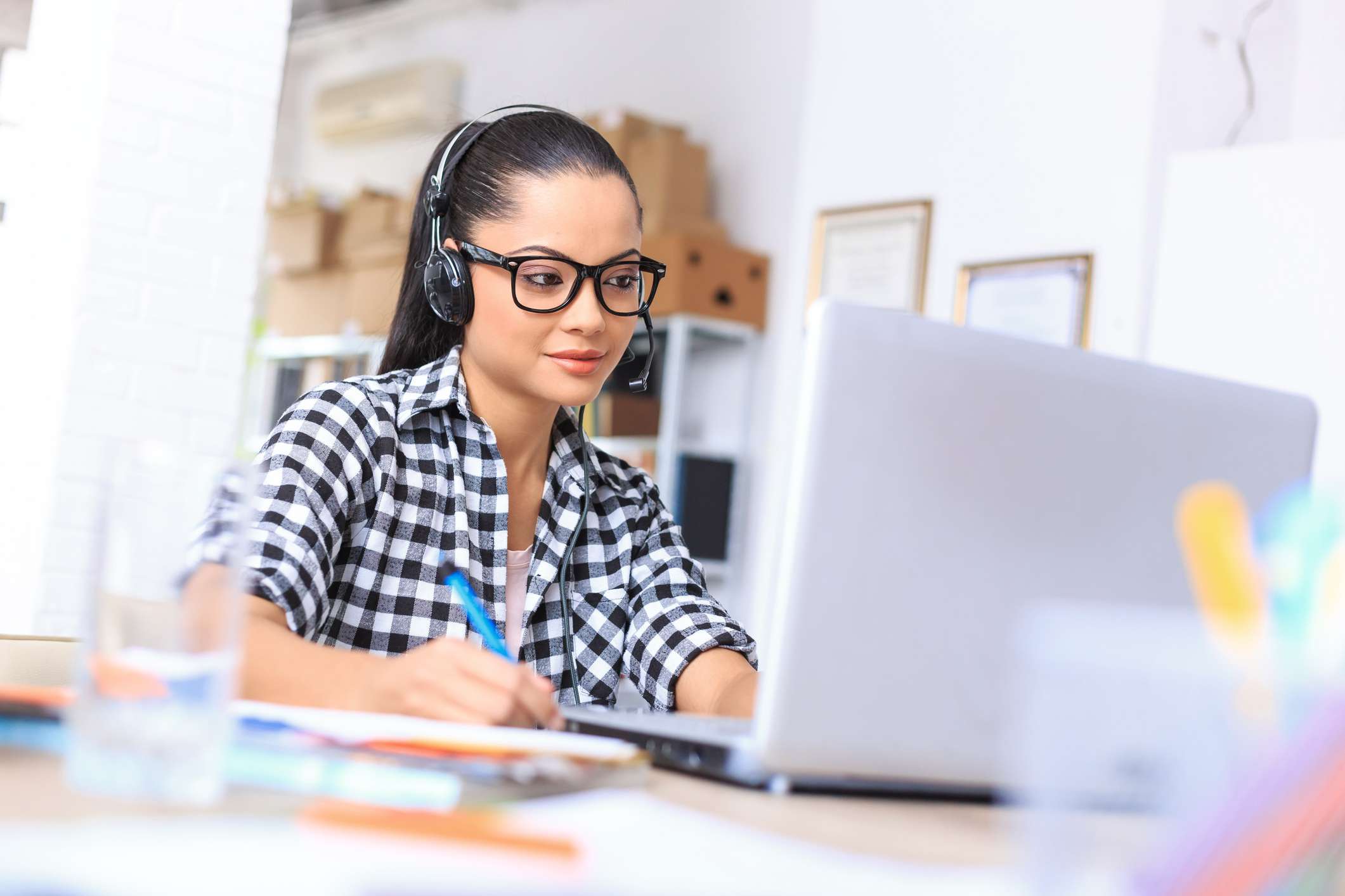 Person with PC and headset