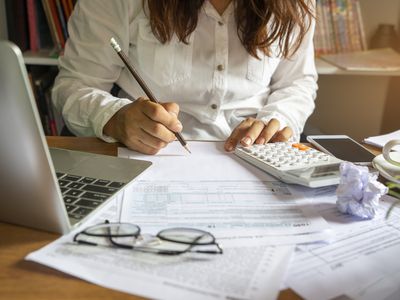 Person at desk doing their taxes