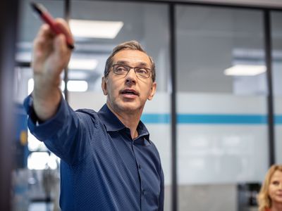 Businessman giving a presentation in an office