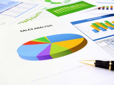 Graphs and charts on the desk.